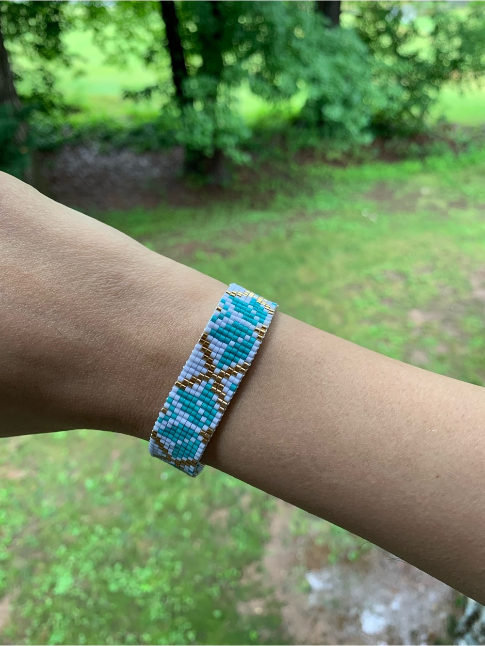 Handwoven Turquoise & White Beaded Bracelet with Gold Accents
